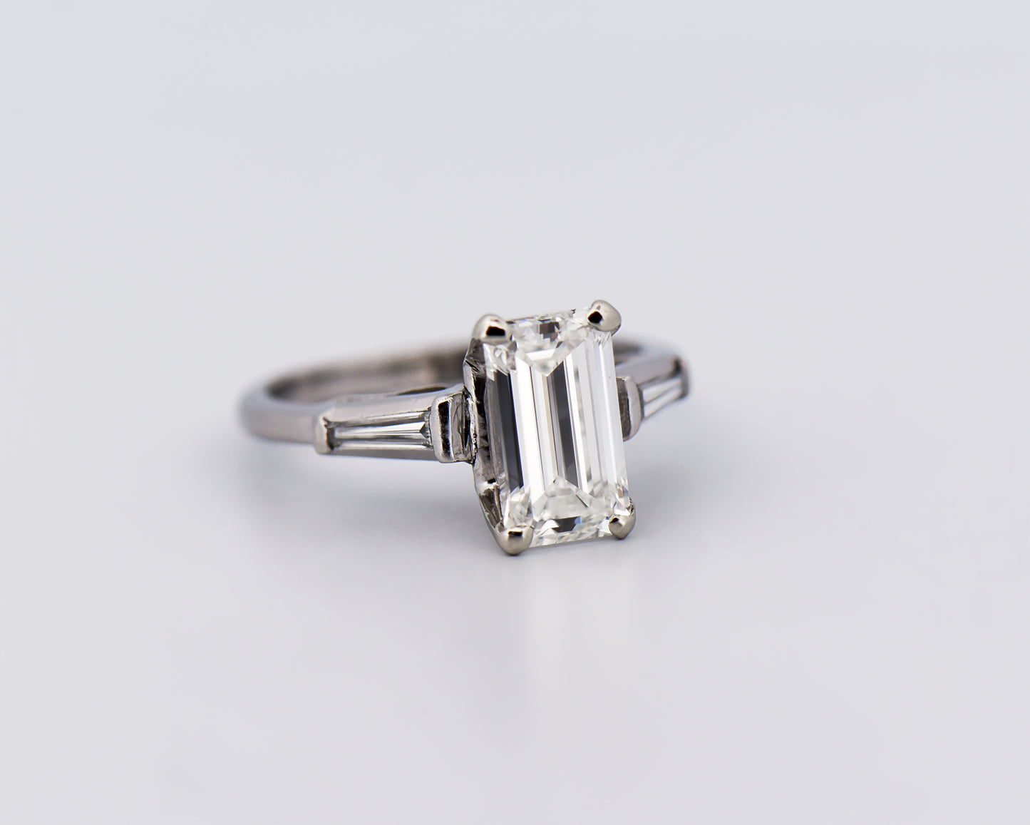 Elongated Emerald Cut Diamond Ring with Baguette Accents in Platinum