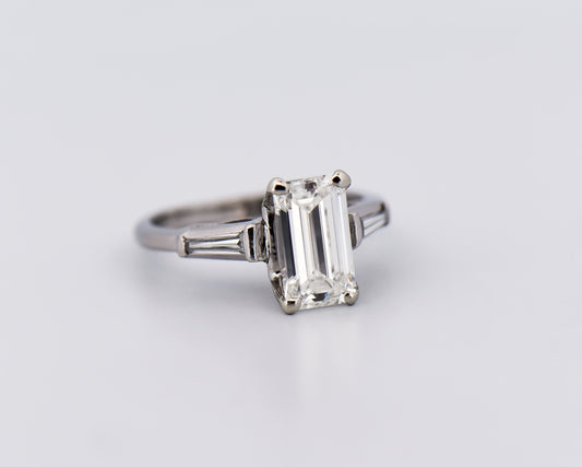 Elongated Emerald Cut Diamond Ring with Baguette Accents in Platinum