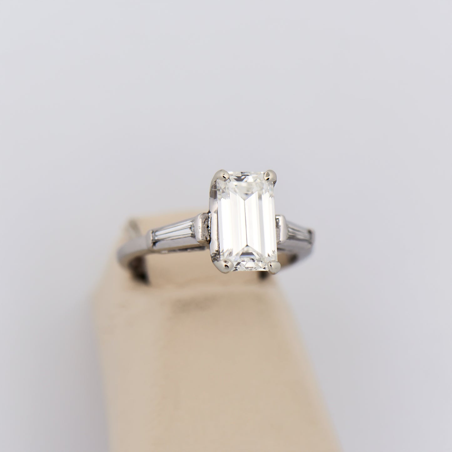 Elongated Emerald Cut Diamond Ring with Baguette Accents in Platinum