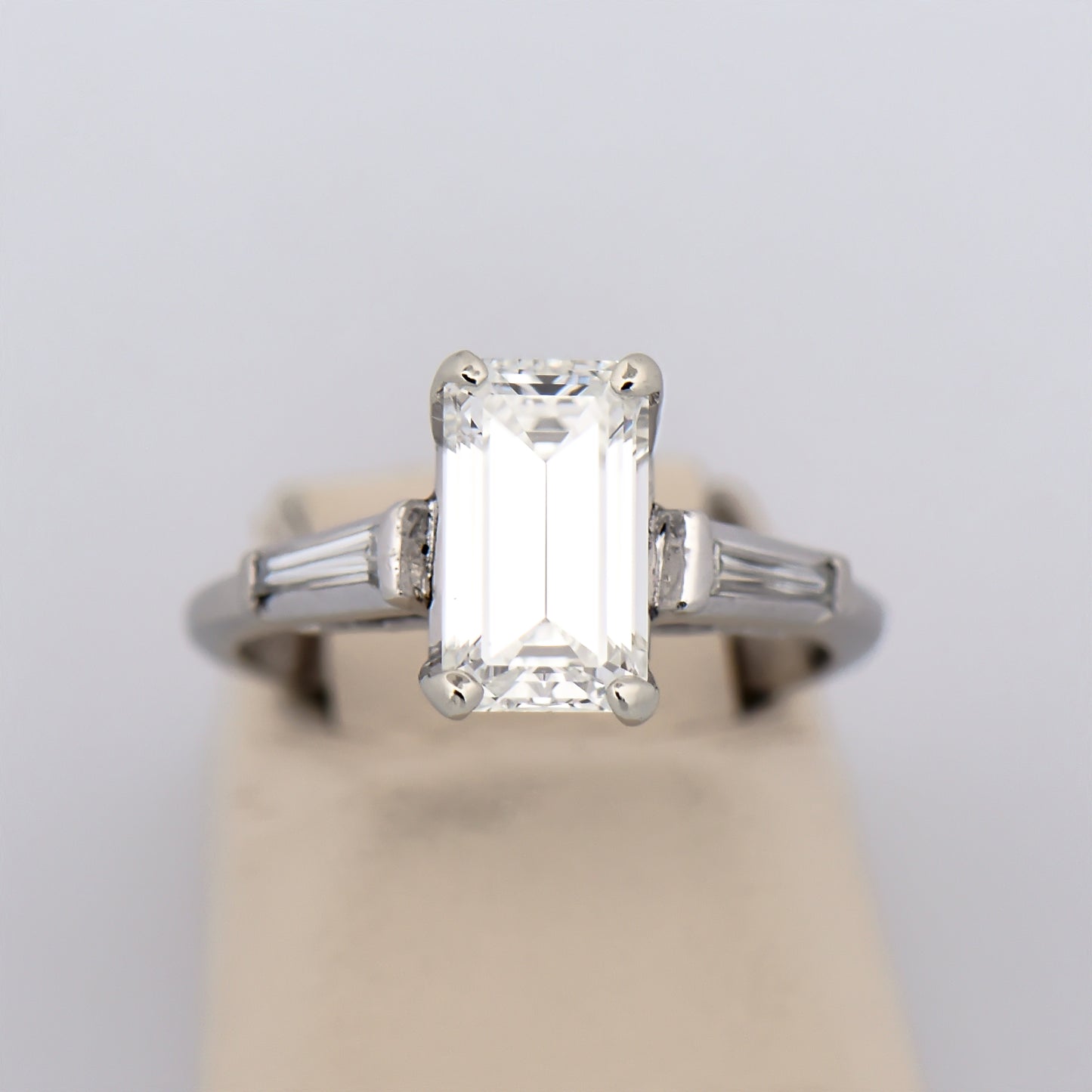 Elongated Emerald Cut Diamond Ring with Baguette Accents in Platinum