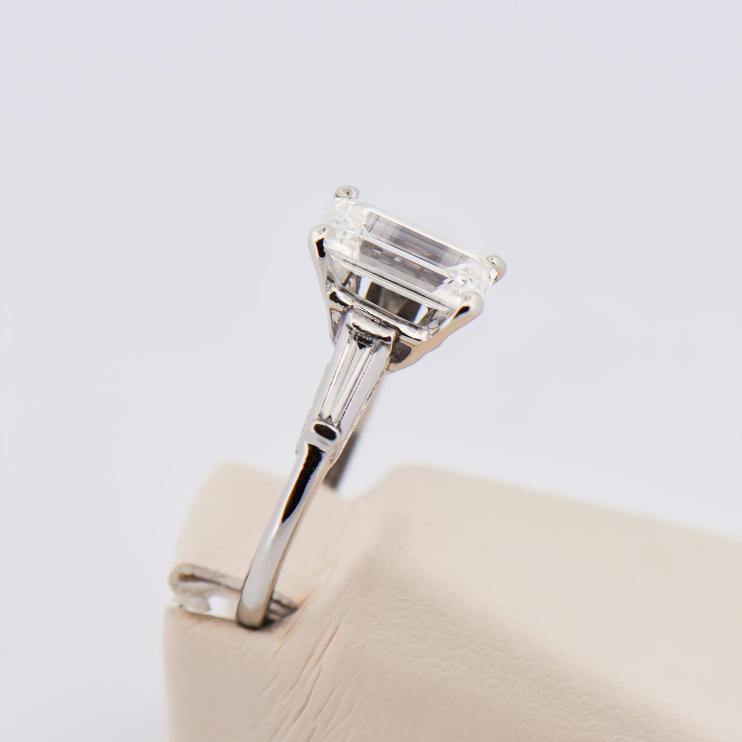 Elongated Emerald Cut Diamond Ring with Baguette Accents in Platinum