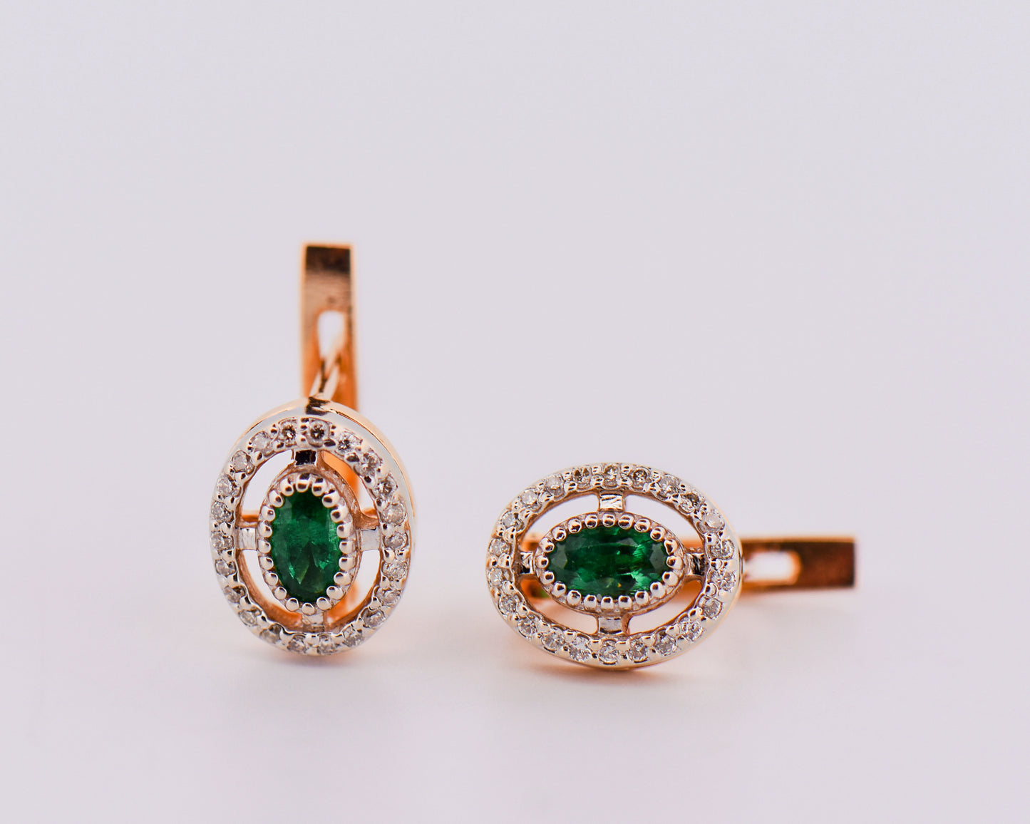 Emerald and Diamond Halo Earrings in Two-Tone Gold