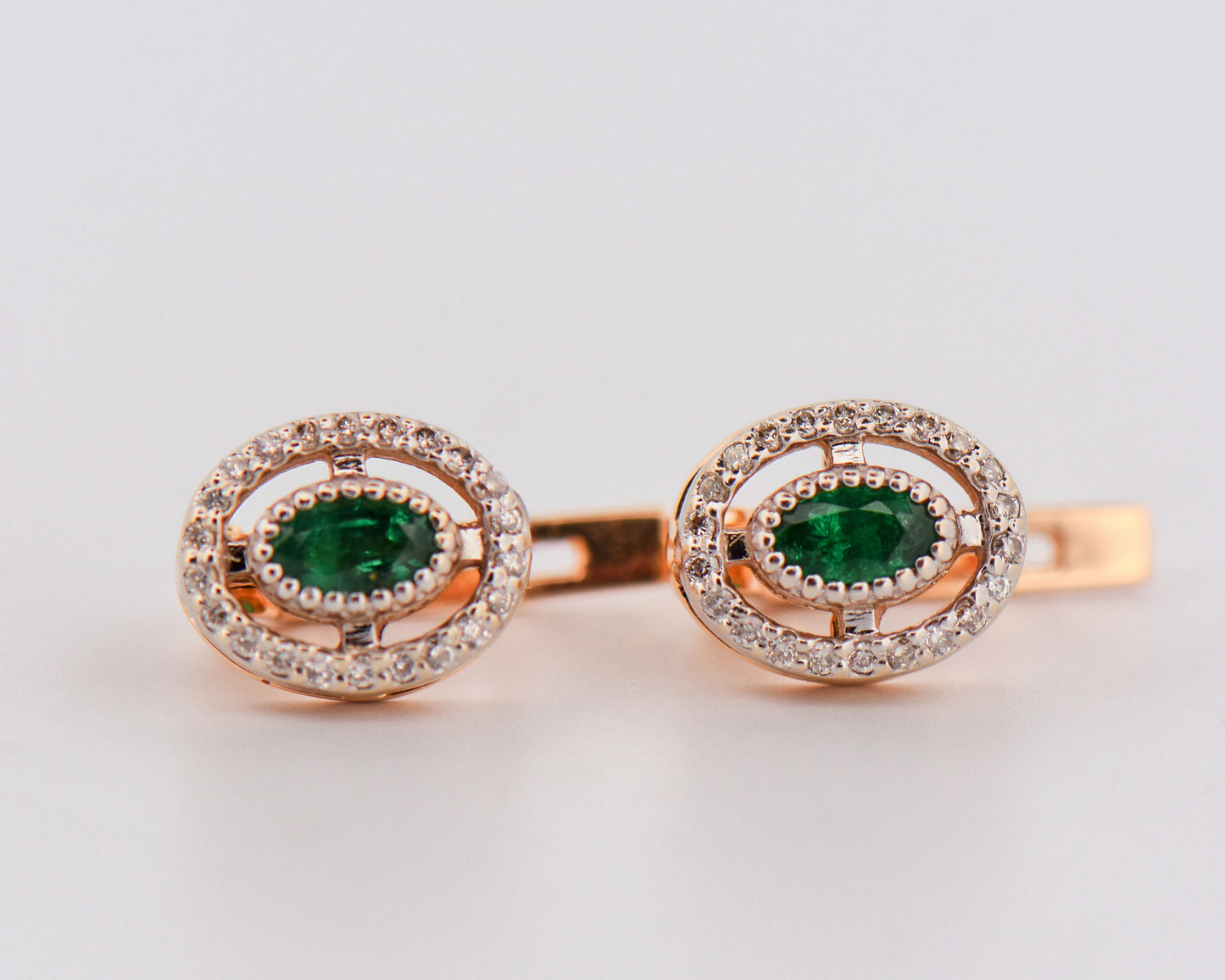 Emerald and Diamond Halo Earrings in Two-Tone Gold