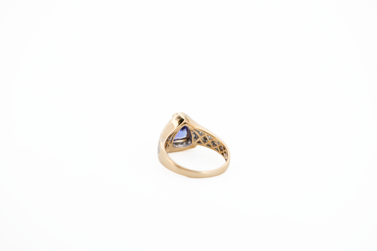 Estate AAA Trillion Tanzanite & Diamond Halo Ring in Yellow Gold
