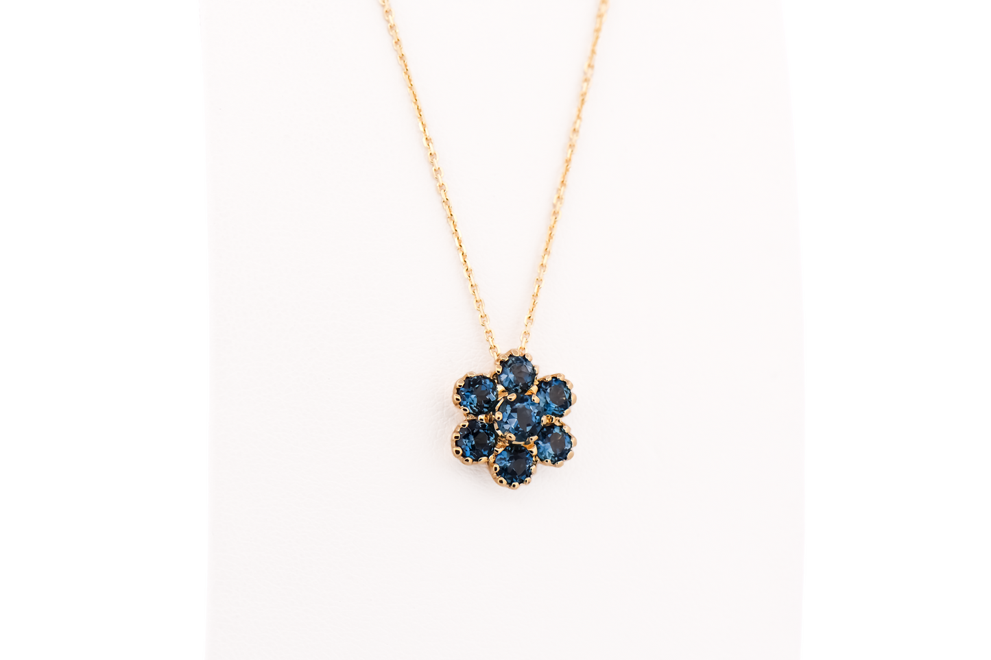 Estate London Blue Topaz Flower Cluster Pendant in Yellow Gold