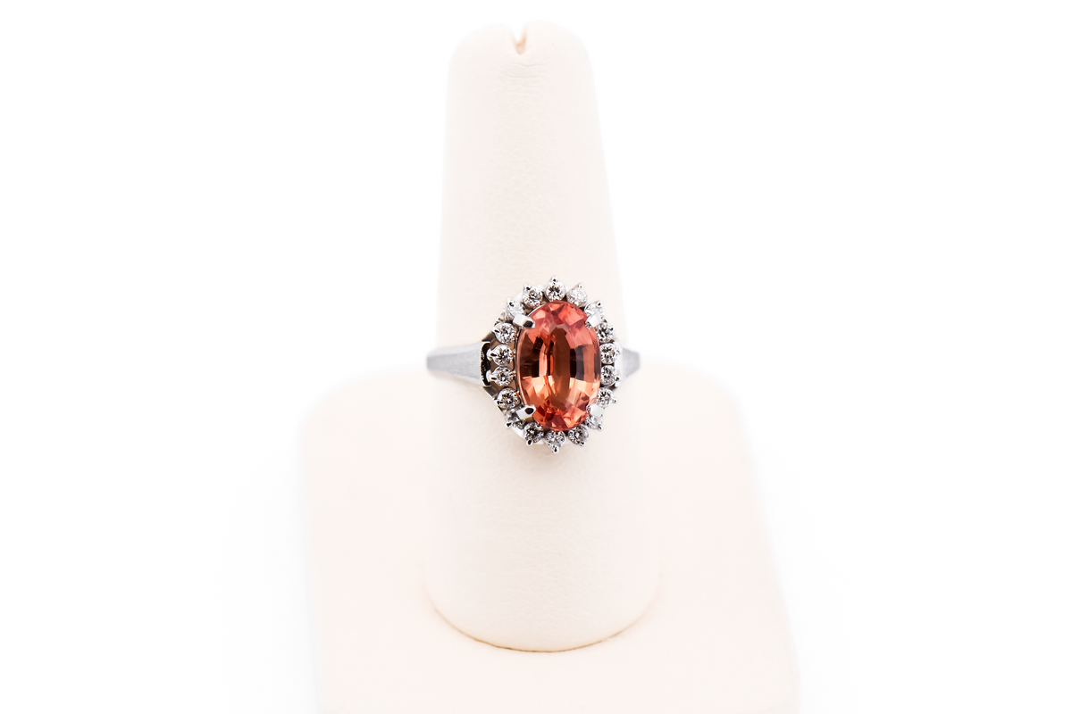 Estate Oval Imperial Topaz & Diamond Halo Ring in Platinum