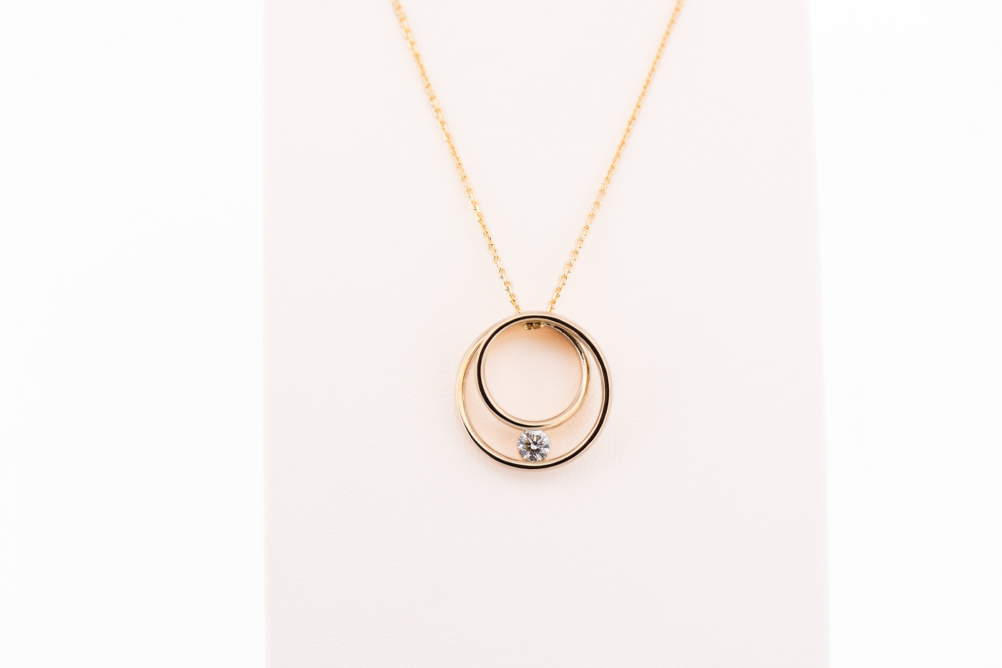 Eternal Circle Pendant in 14k Yellow Gold with Diamond Accent