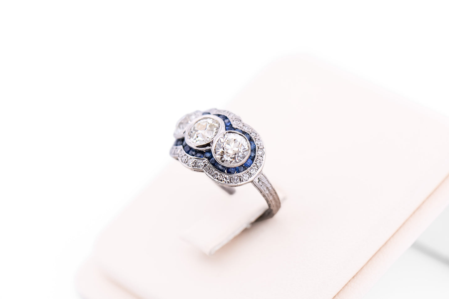 Exceptional Art Deco Platinum Diamond 3-Stone Ring with Sapphire Accents