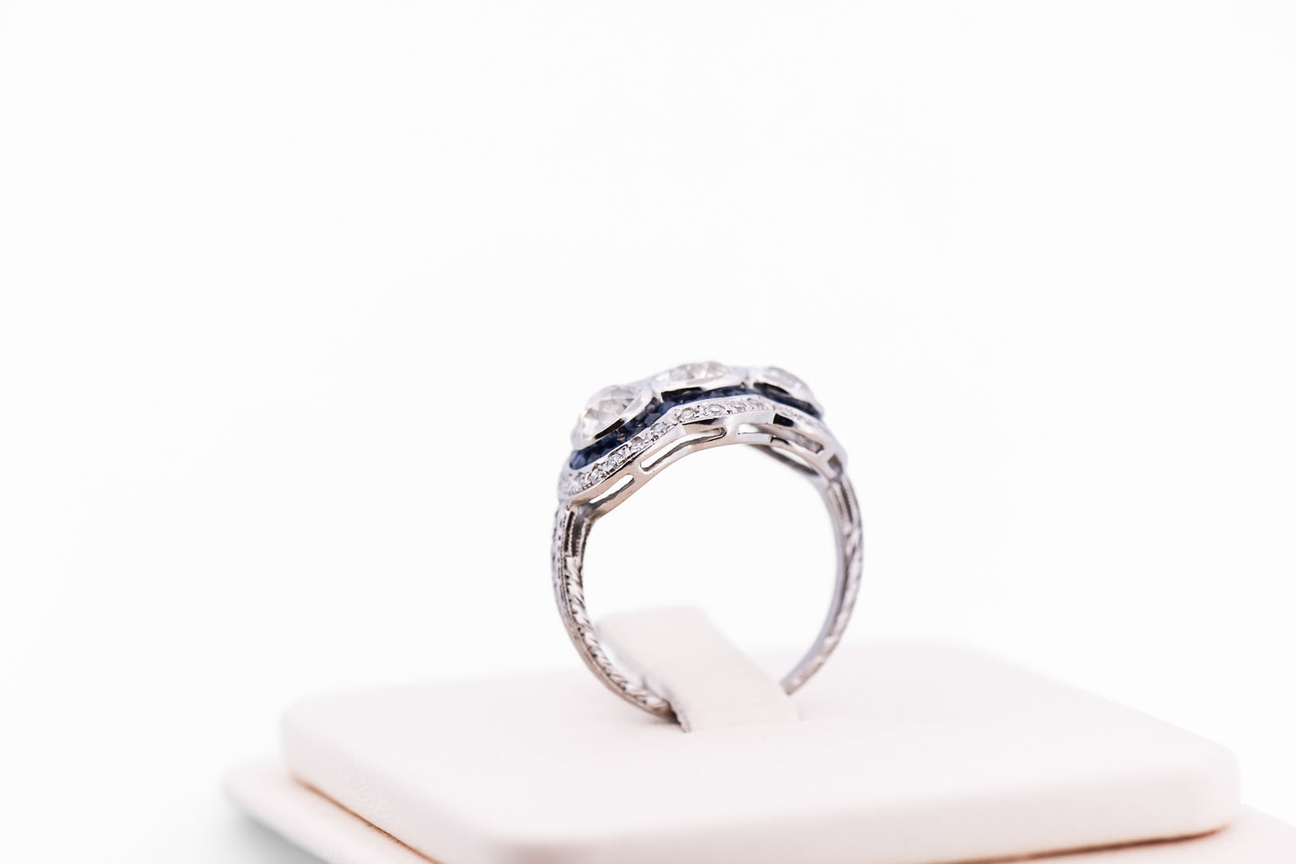 Exceptional Art Deco Platinum Diamond 3-Stone Ring with Sapphire Accents