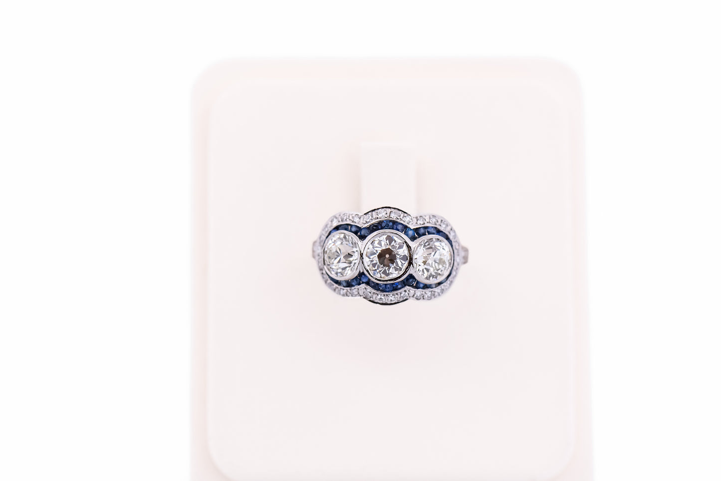 Exceptional Art Deco Platinum Diamond 3-Stone Ring with Sapphire Accents