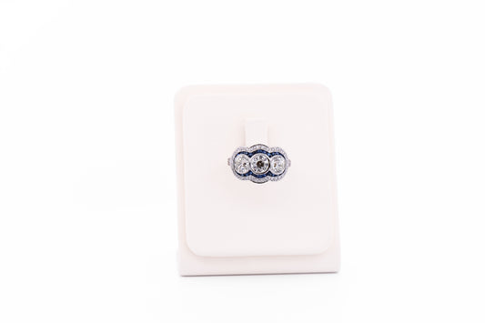 Exceptional Art Deco Platinum Diamond 3-Stone Ring with Sapphire Accents