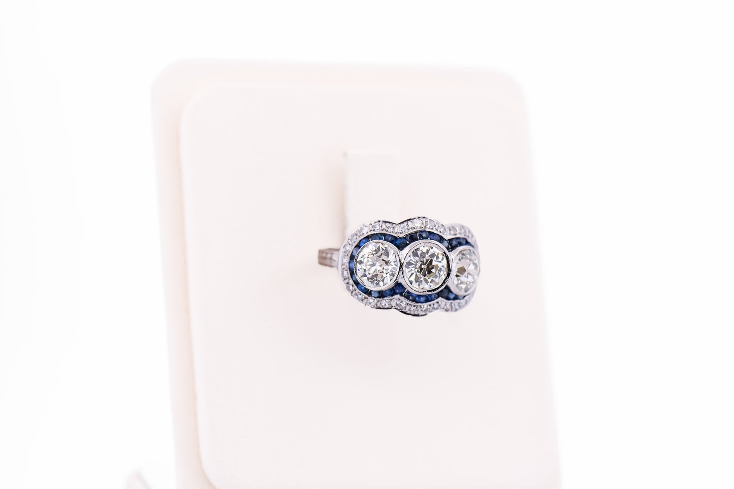 Exceptional Art Deco Platinum Diamond 3-Stone Ring with Sapphire Accents