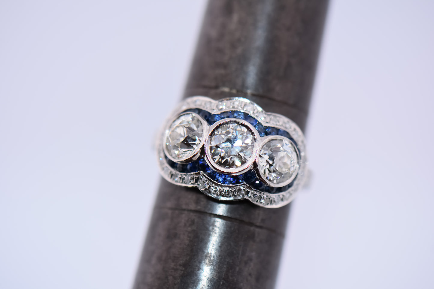 Exceptional Art Deco Platinum Diamond 3-Stone Ring with Sapphire Accents