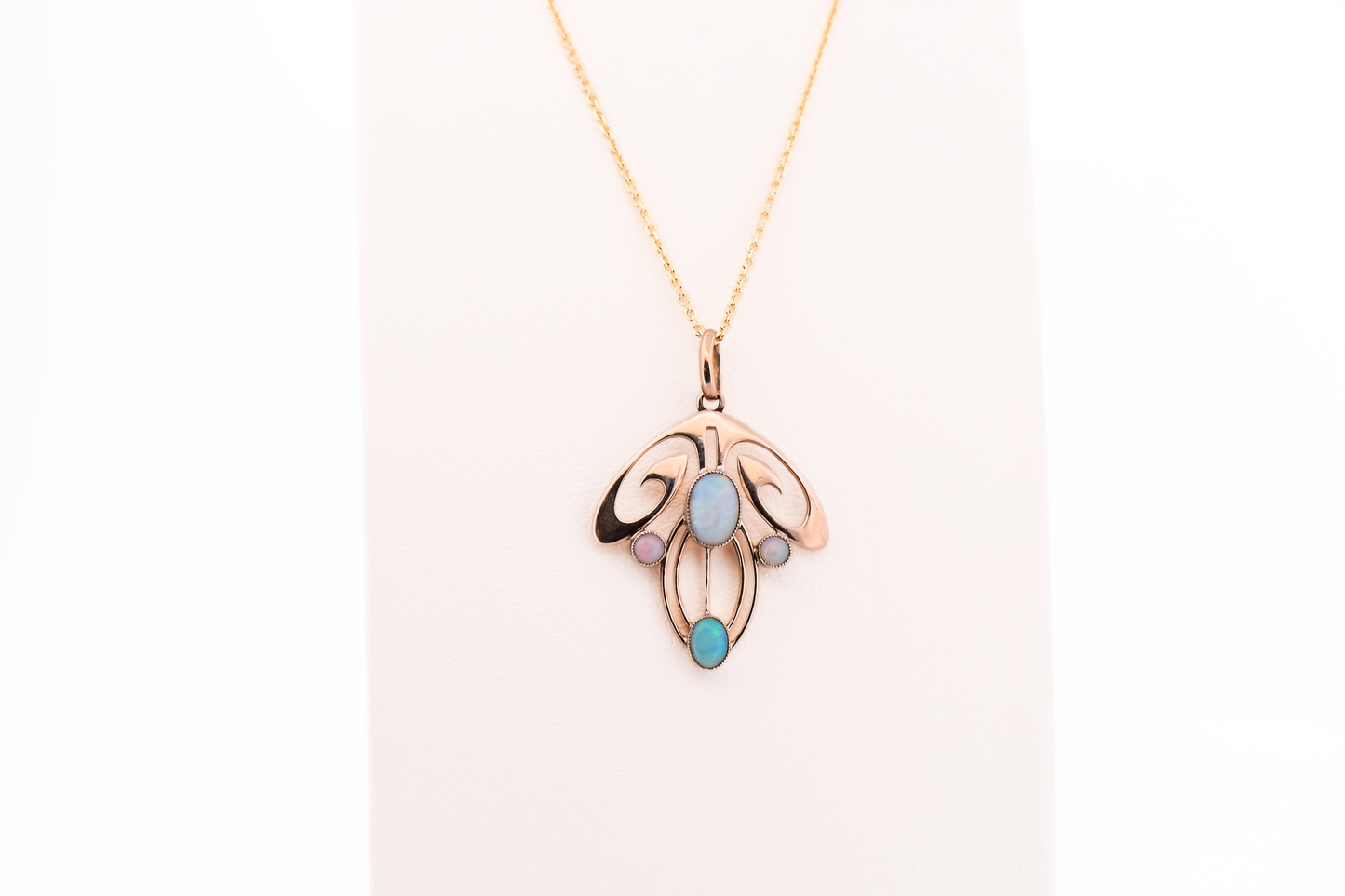 Flowing Art Nouveau Opal Pendant in 9k Rosy Yellow Gold