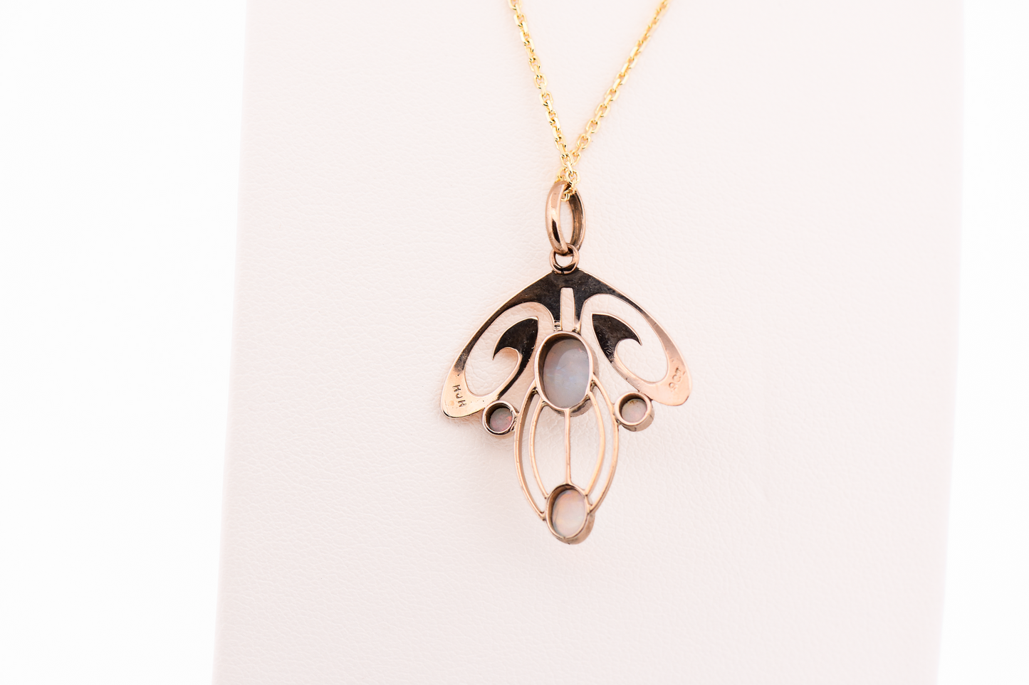 Flowing Art Nouveau Opal Pendant in 9k Rosy Yellow Gold