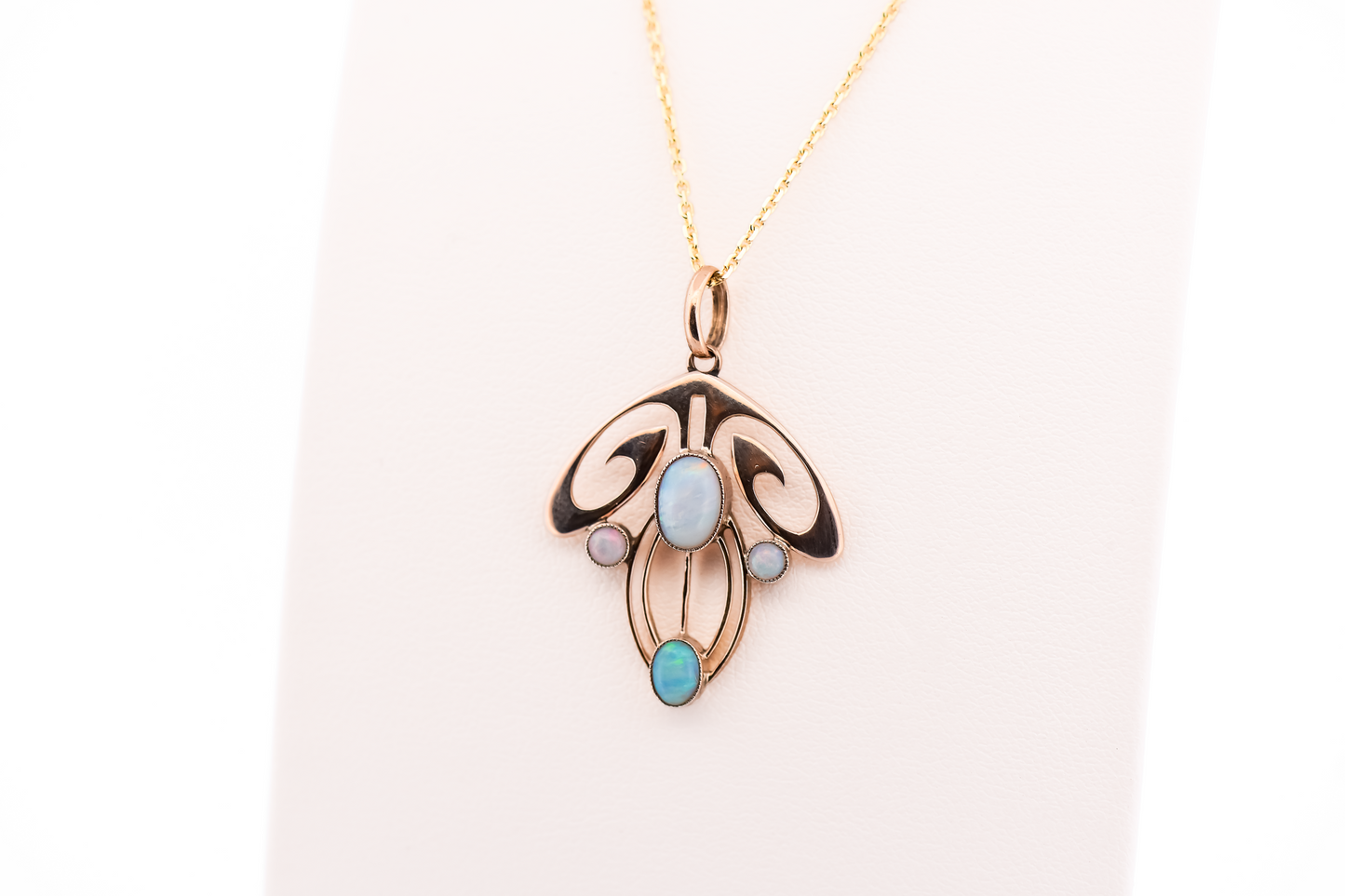 Flowing Art Nouveau Opal Pendant in 9k Rosy Yellow Gold