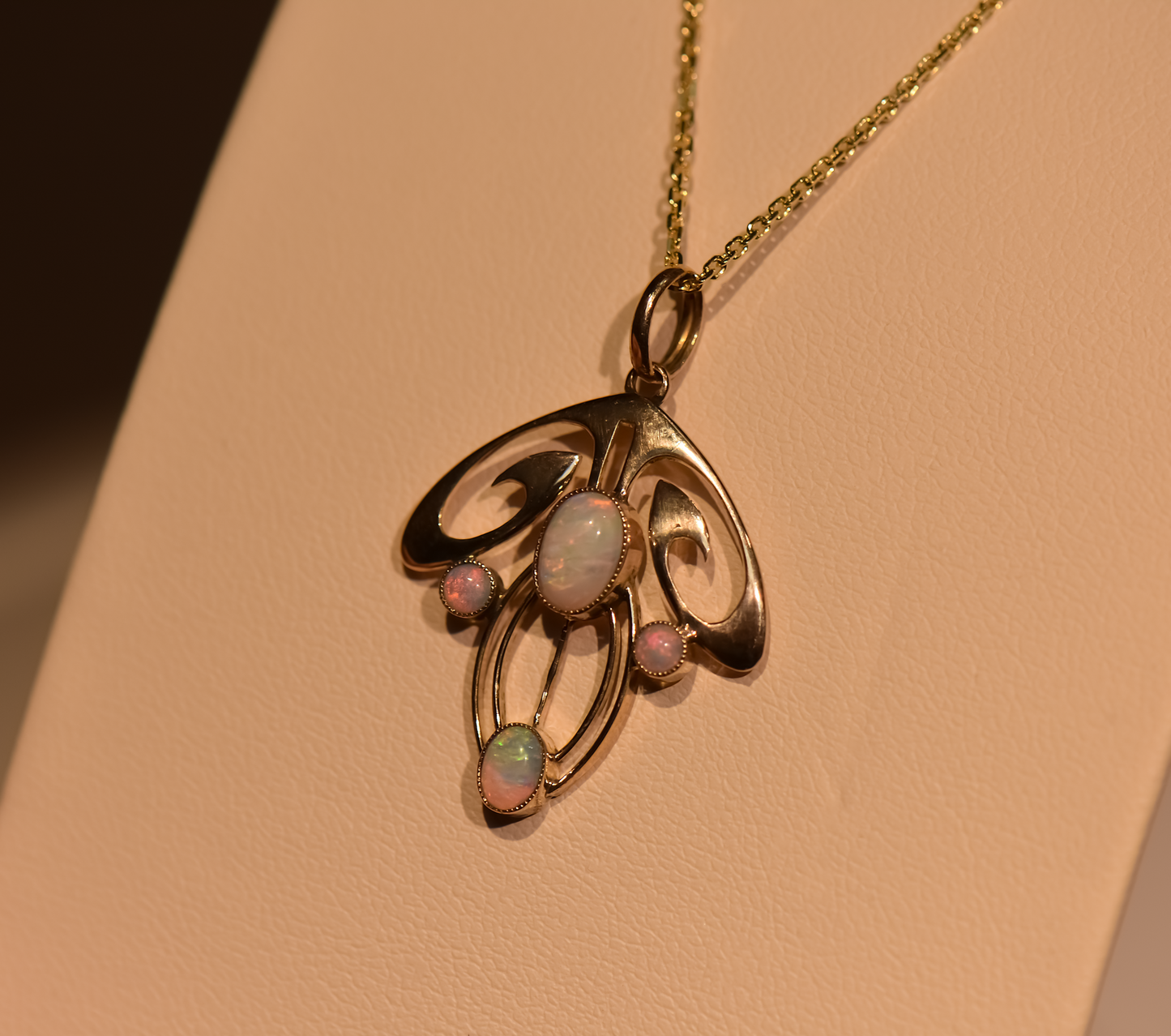 Flowing Art Nouveau Opal Pendant in 9k Rosy Yellow Gold