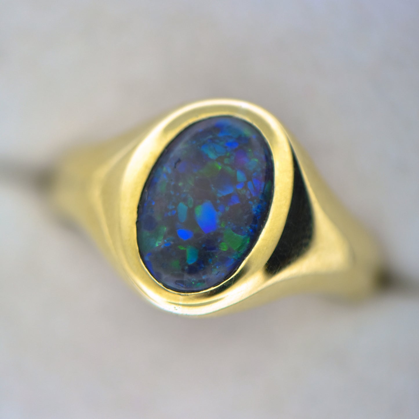 Vintage British Gent's Ring with Peacock Hued Black Opal
