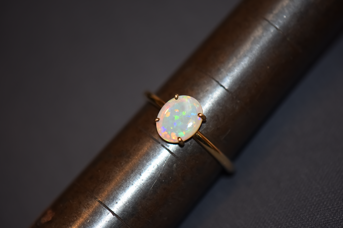 Glittery Opal Solitaire Engagement Ring in Yellow Gold
