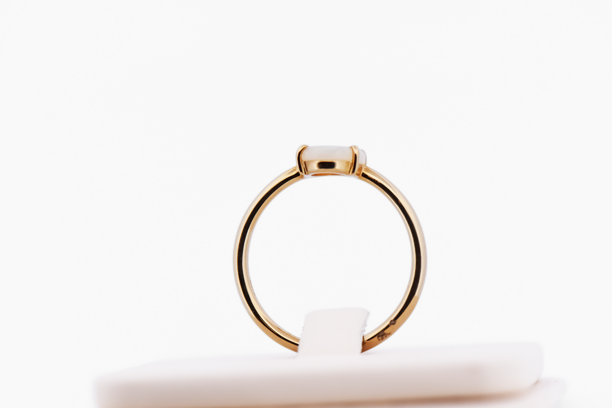 Glittery Opal Solitaire Engagement Ring in Yellow Gold