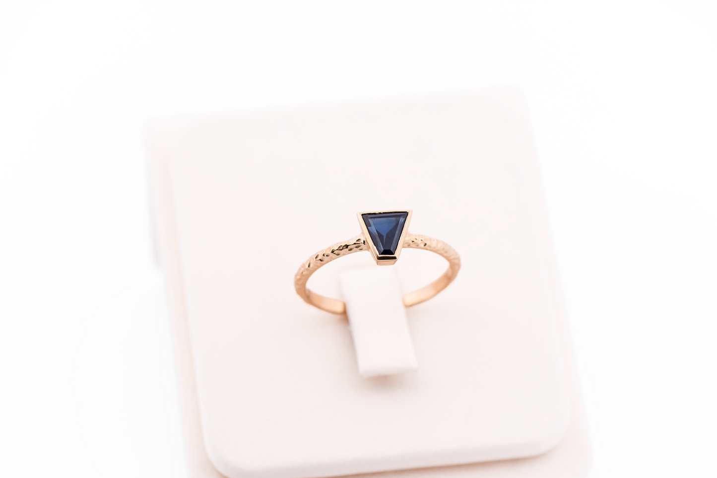 Gold Bezel-Set Solitaire Engagement Ring with Trapezoid Blue Sapphire