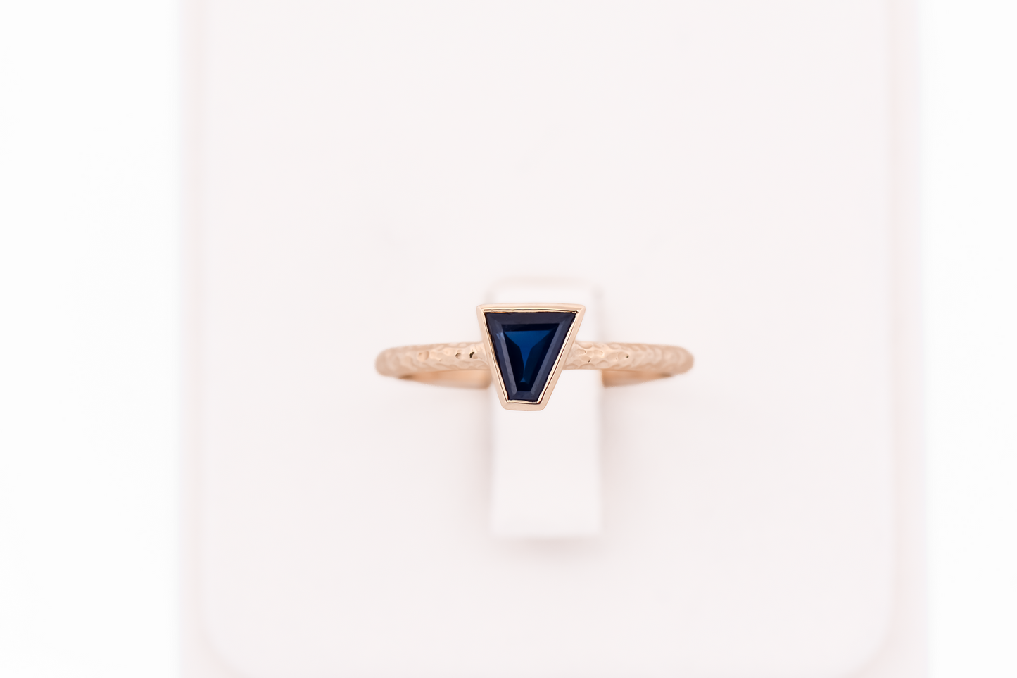 Gold Bezel-Set Solitaire Engagement Ring with Trapezoid Blue Sapphire