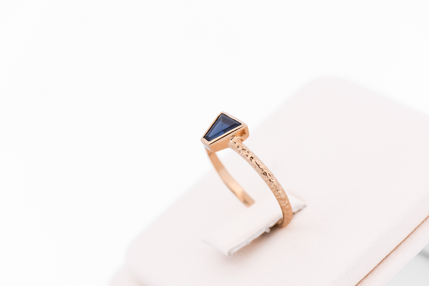 Gold Bezel-Set Solitaire Engagement Ring with Trapezoid Blue Sapphire