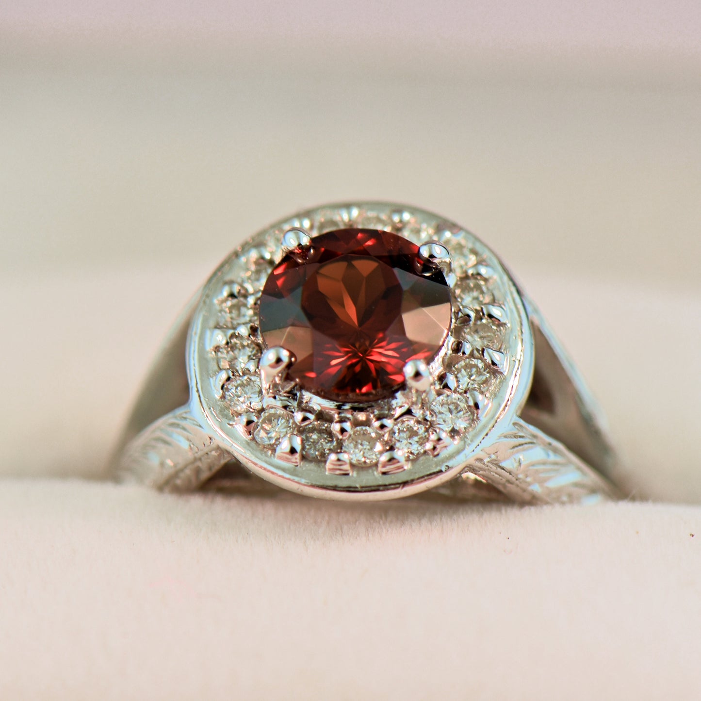 Carved White Gold Ring with Round Red Hessonite Garnet
