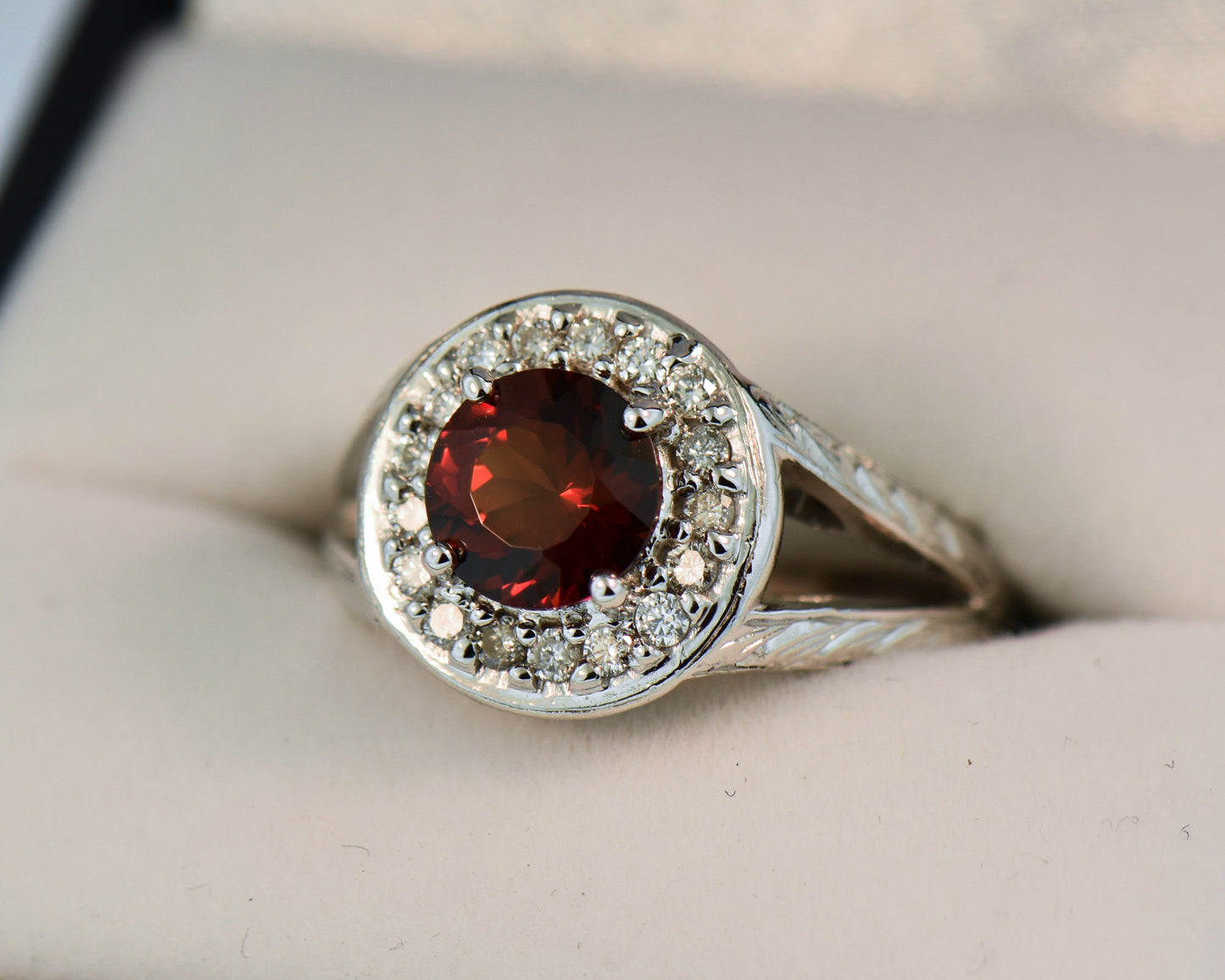 Carved White Gold Ring with Round Red Hessonite Garnet