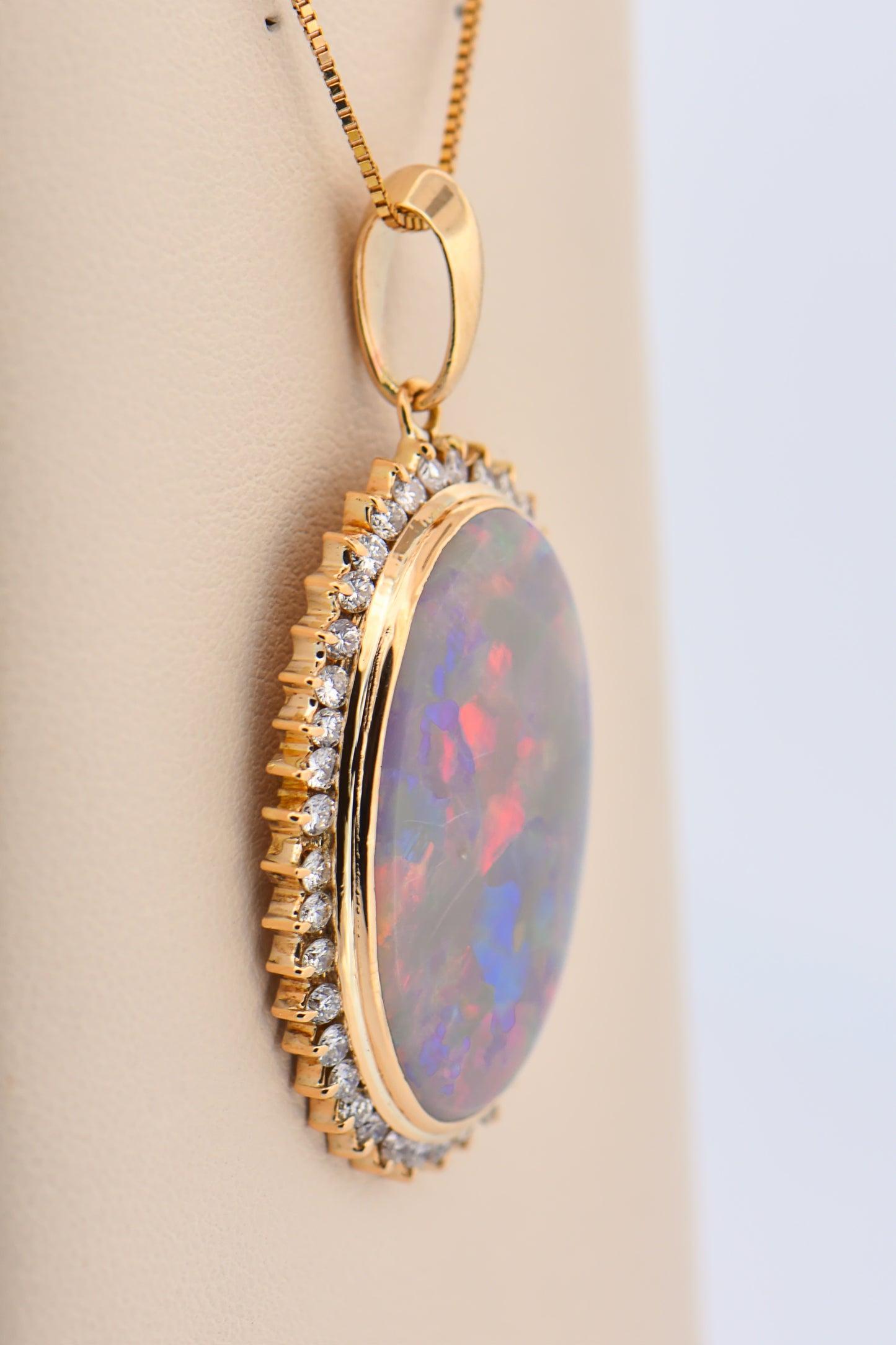 Large Opal Pendant with Diamond Halo in Yellow Gold