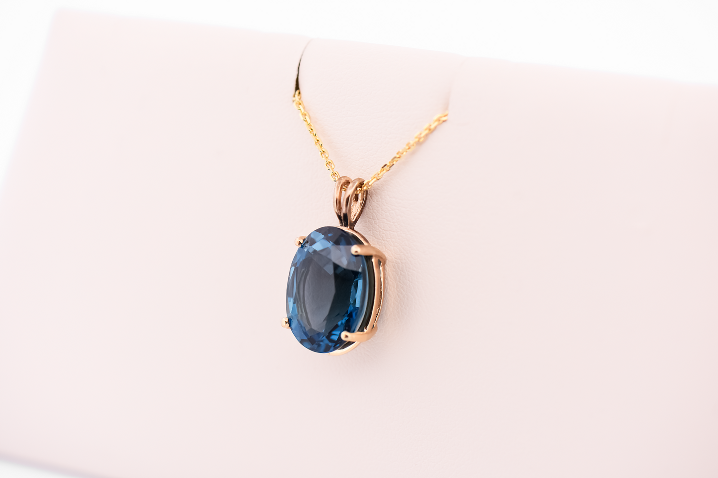 London Blue Topaz Oval Solitaire Pendant in 14k Yellow Gold