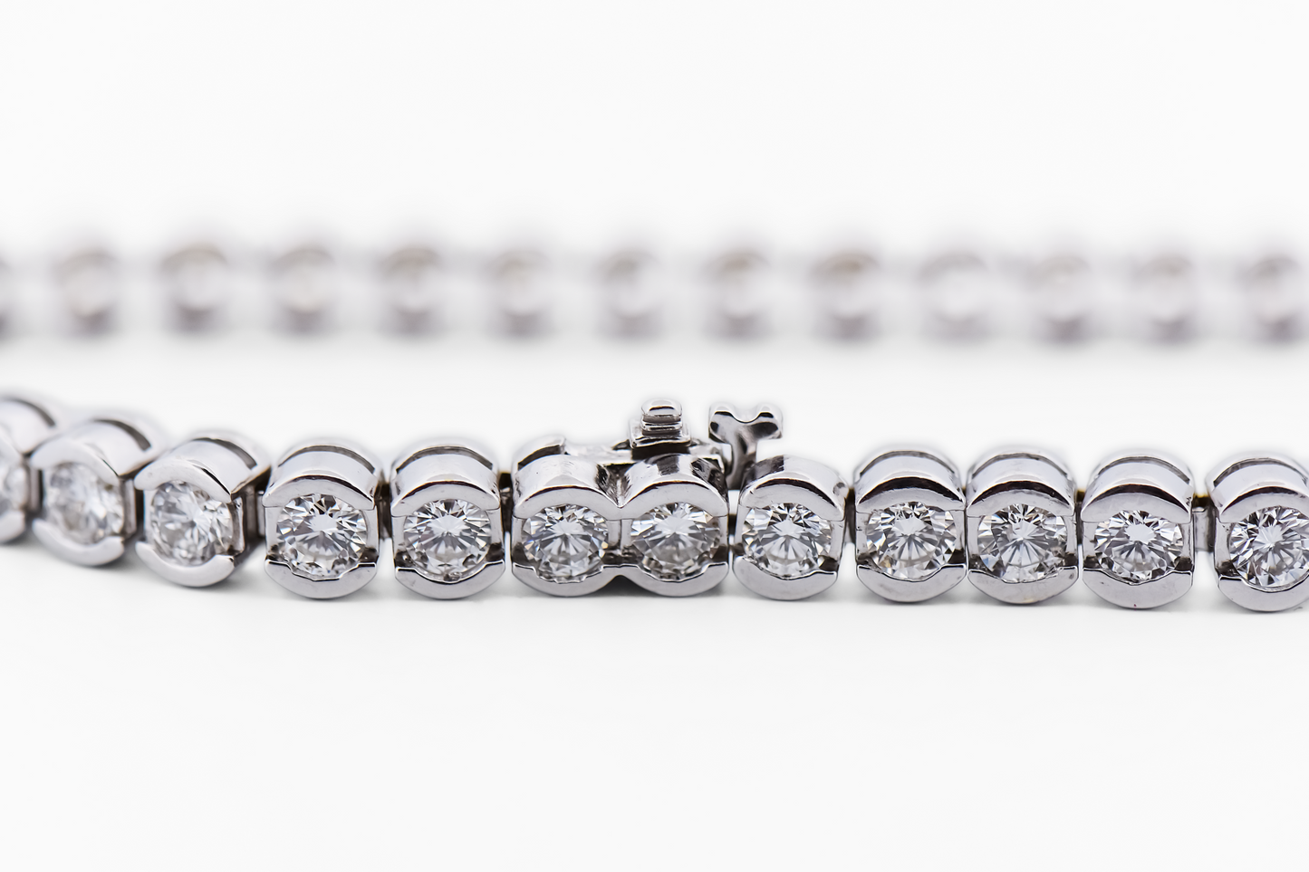 Luxurious Semi-Bezel Set Diamond Tennis Bracelet in 18k White Gold