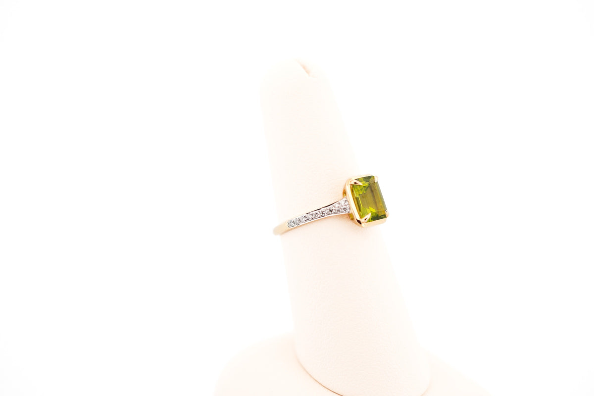 Modern Emerald Cut Peridot Ring with Diamond Accents in Yellow Gold