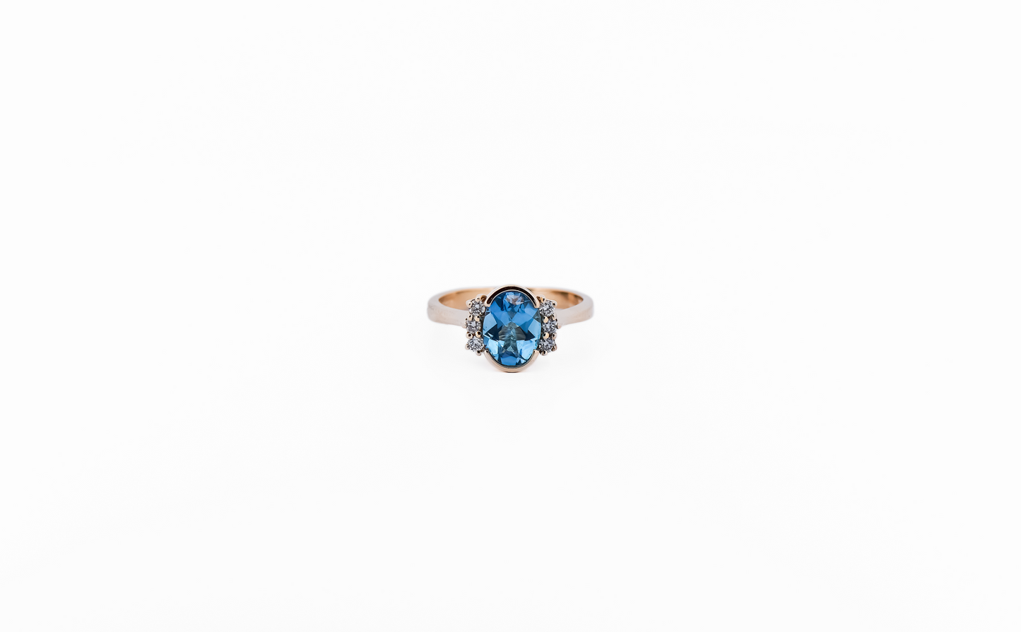 Modern Estate Swiss Blue Topaz Ring in Yellow Gold Semi-Bezel