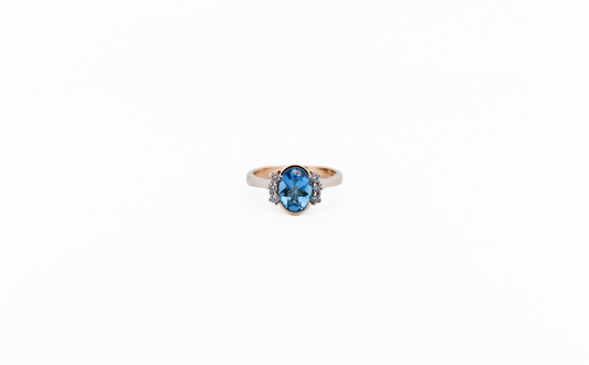 Modern Estate Swiss Blue Topaz Ring in Yellow Gold Semi-Bezel