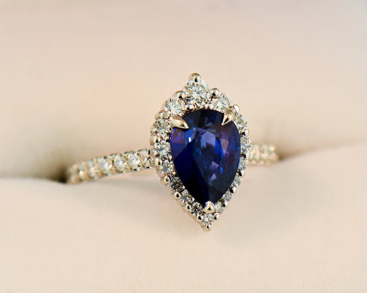 Modern Pear Shape Blue Sapphire & Diamond Halo Ring