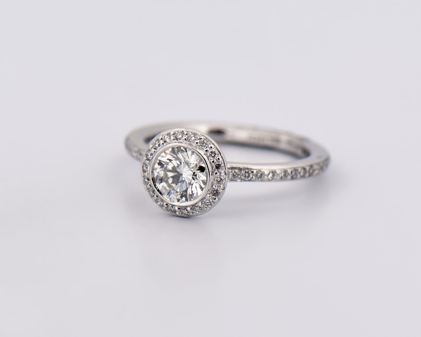 Modern Round Diamond Halo Engagement Ring with Eternity Style Band