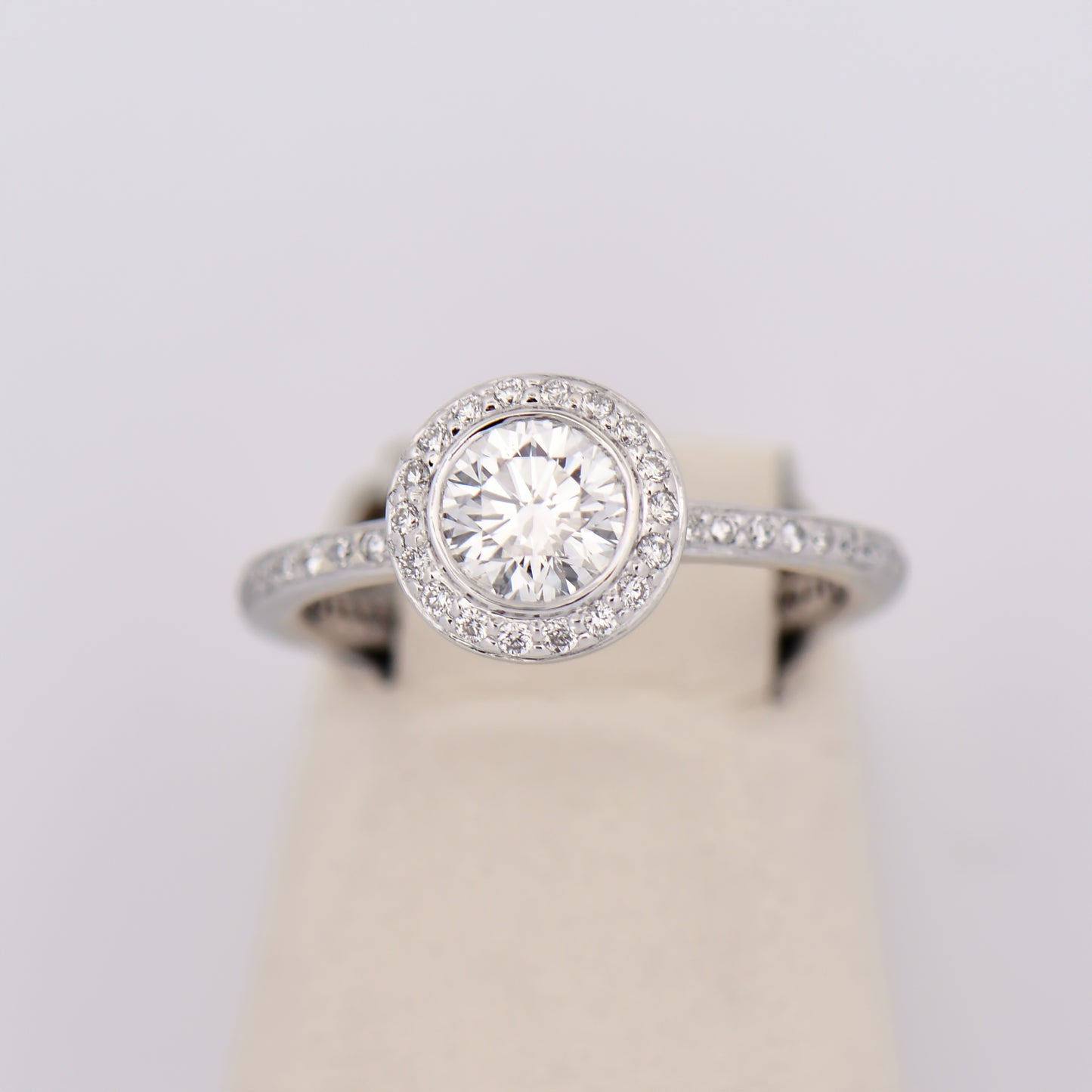Modern Round Diamond Halo Engagement Ring with Eternity Style Band