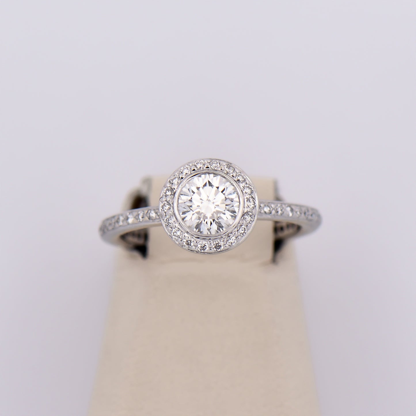 Modern Round Diamond Halo Engagement Ring with Eternity Style Band