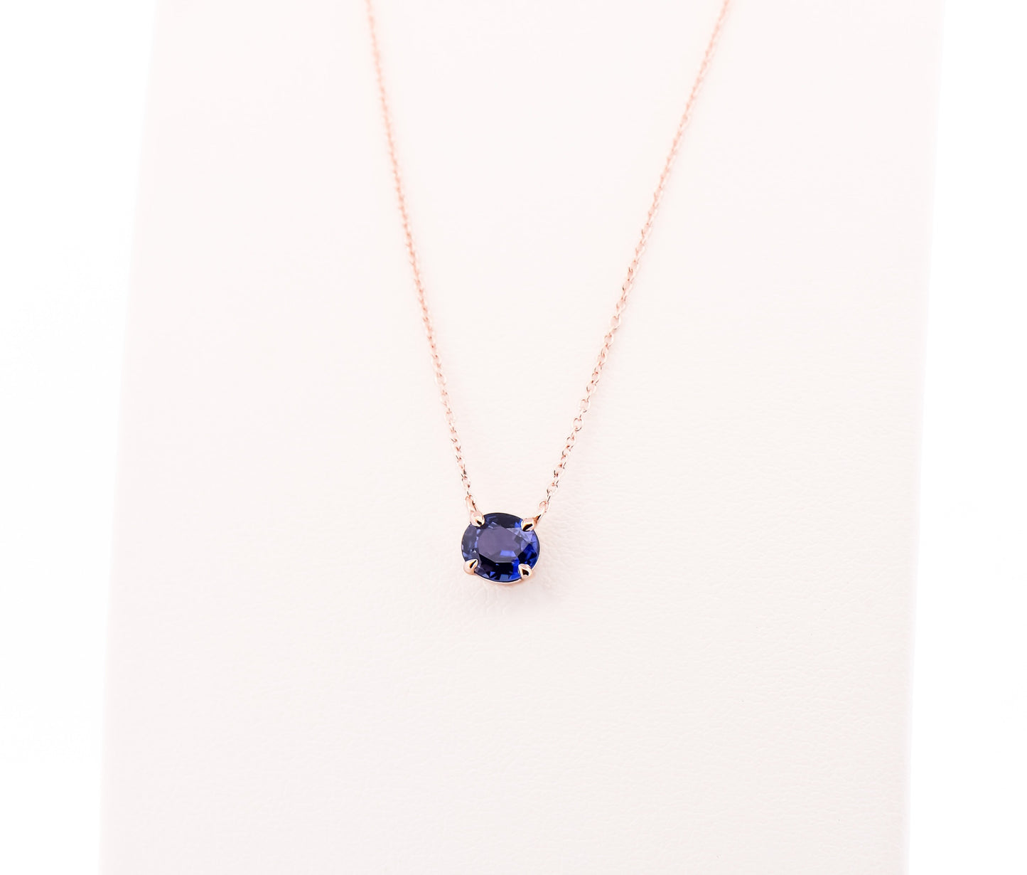 Modern Solitaire Necklace with Color Changing Purple Sapphire Set in Rose Gold