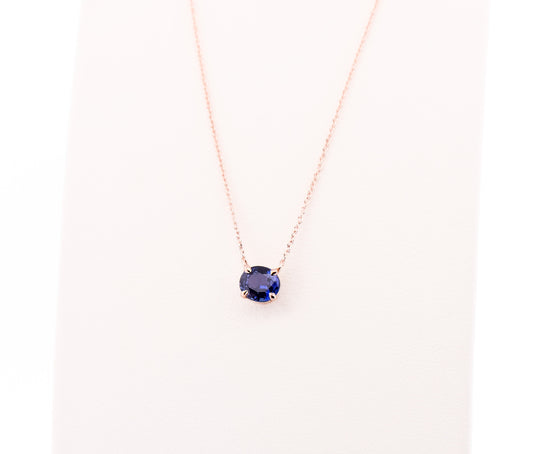 Modern Solitaire Necklace with Color Changing Purple Sapphire Set in Rose Gold