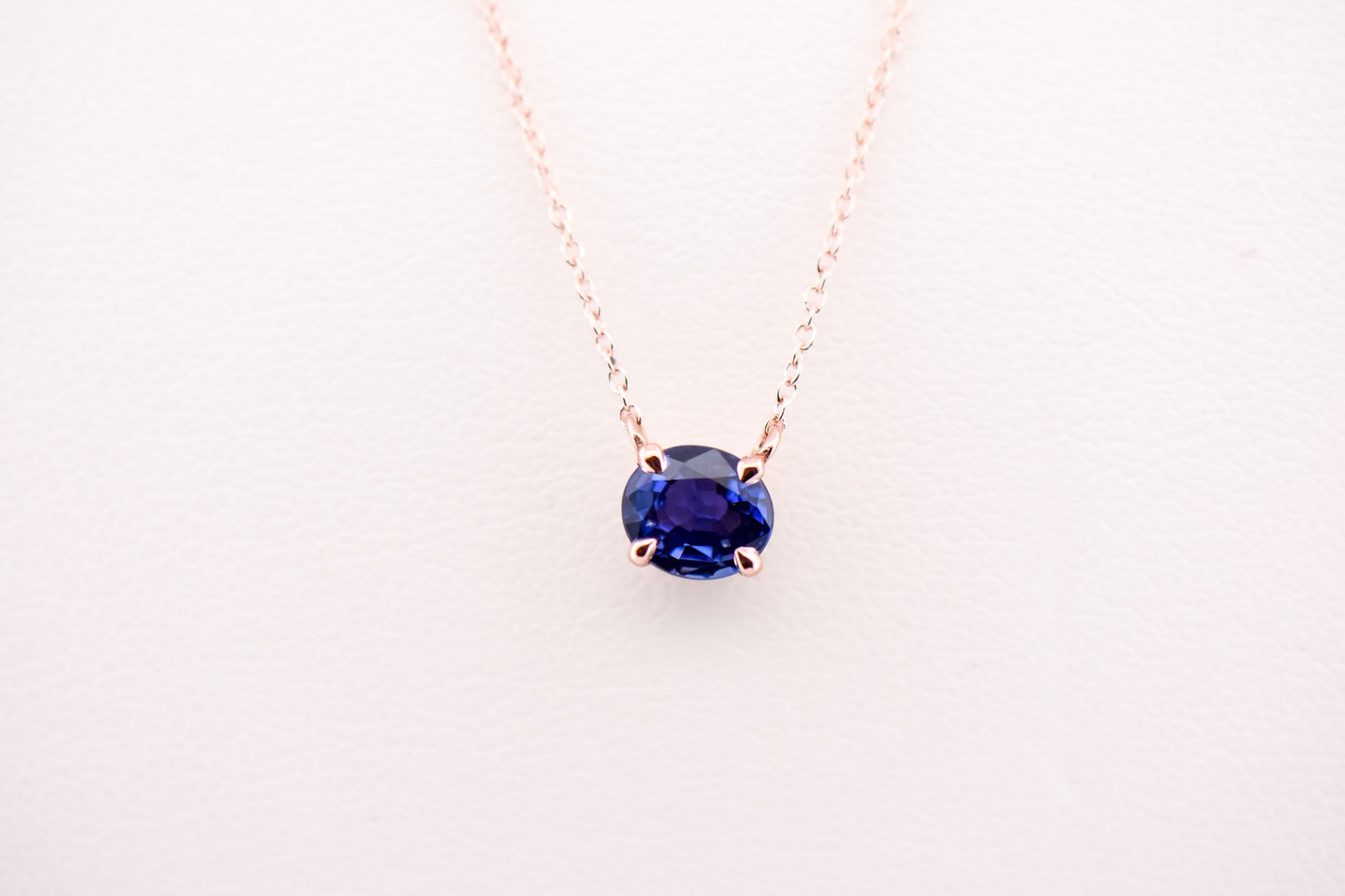 Modern Solitaire Necklace with Color Changing Purple Sapphire Set in Rose Gold