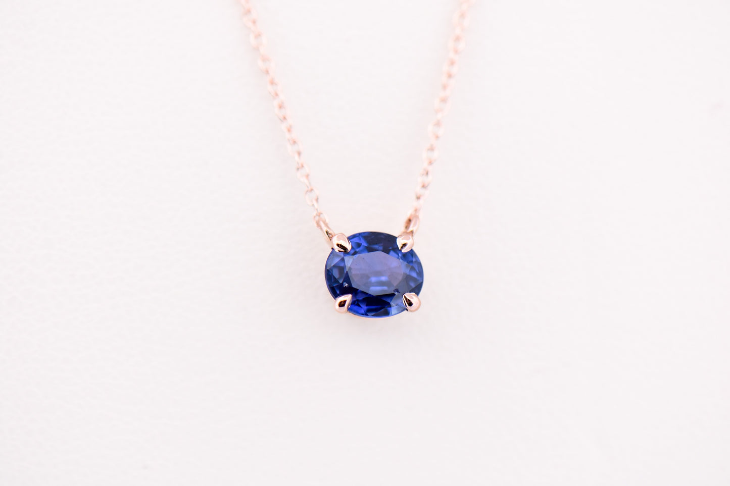 Modern Solitaire Necklace with Color Changing Purple Sapphire Set in Rose Gold