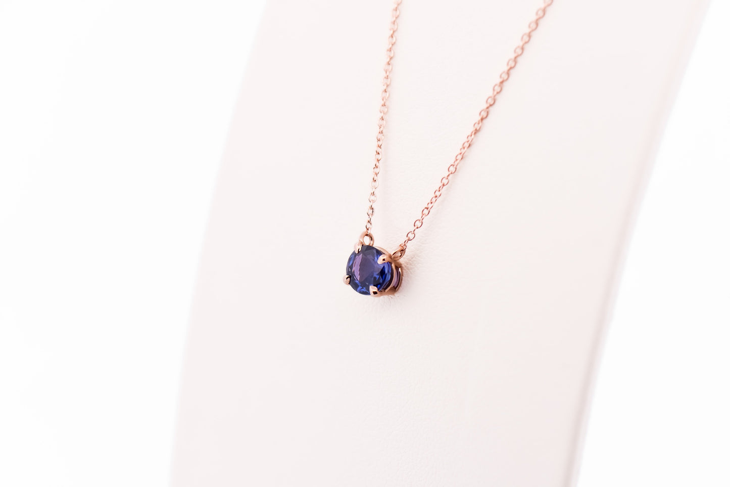 Modern Solitaire Necklace with Color Changing Purple Sapphire Set in Rose Gold