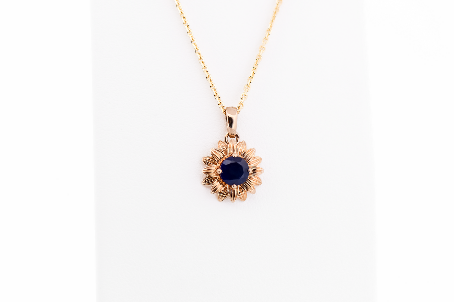 Navy Blue Sapphire Flower Pendant in Yellow Gold