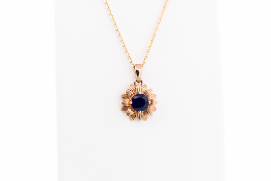 Navy Blue Sapphire Flower Pendant in Yellow Gold