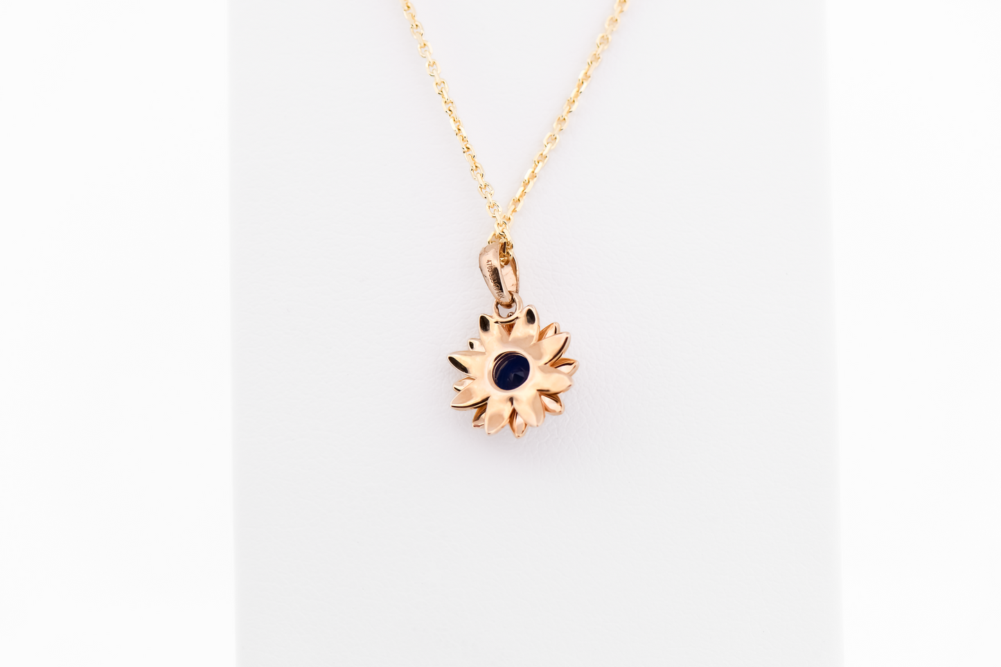 Navy Blue Sapphire Flower Pendant in Yellow Gold