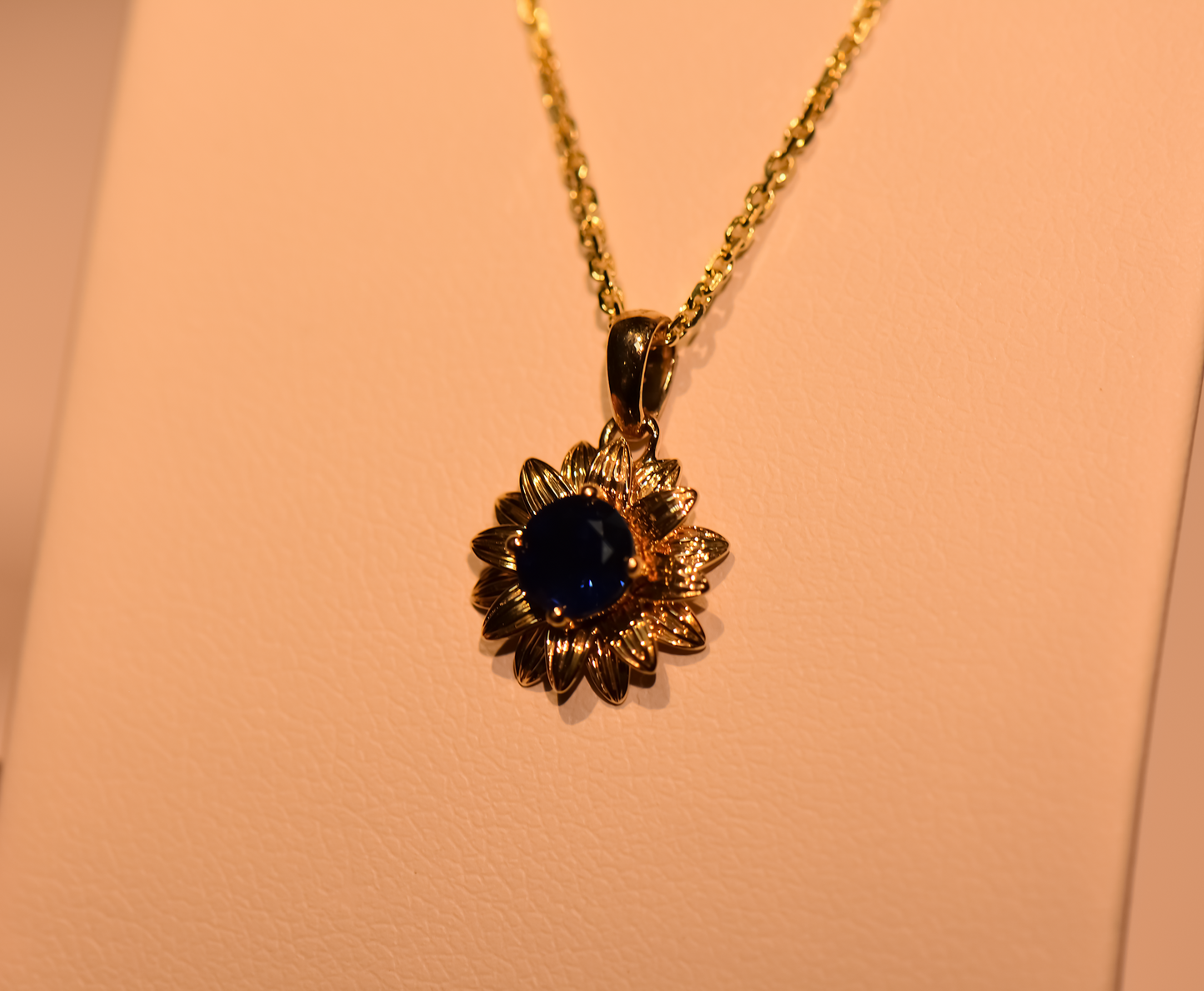 Navy Blue Sapphire Flower Pendant in Yellow Gold