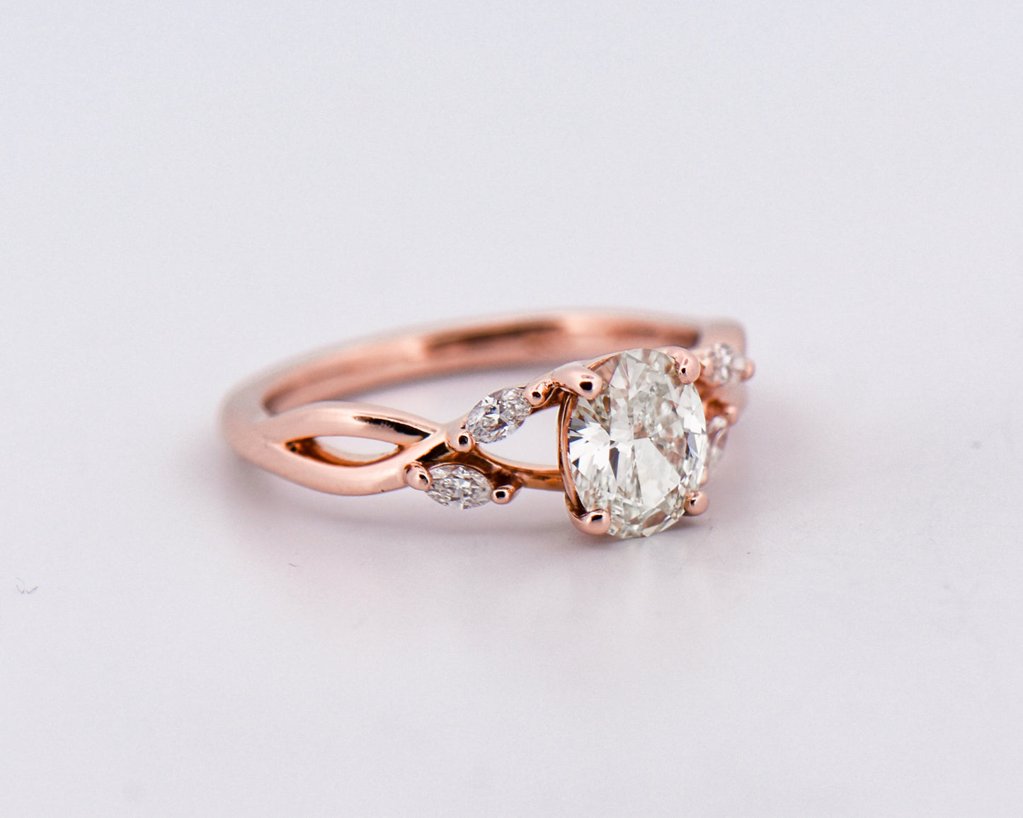 Oval Diamond Engagement Ring with Rose Gold Branch Design