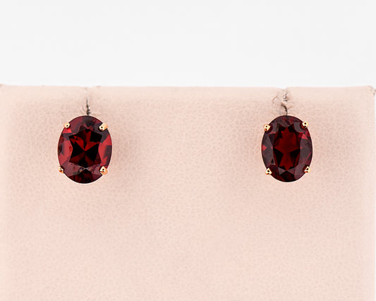 Oval Red Garnet Studs in 14k Yellow Gold